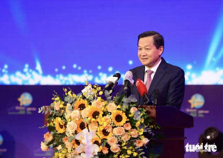 Phó thủ tướng Lê Minh Khái phát biểu tại diễn đàn - Ảnh: QUANG ĐỊNH